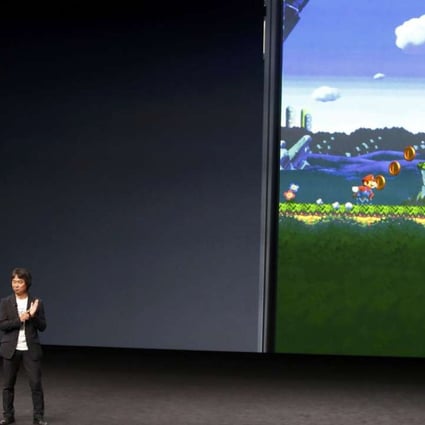 Nintendo’s Shigeru Miyamoto (right) announces Super Mario Run, a mobile game available exclusively for iOS, at Apple’s iPhone 7 media event in San Francisco on September 7. Photo: Reuters