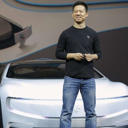 Jia Yueting, co-founder and head of LeEco, unveils its electric concept car, the LeSee, at a ceremony in Beijing in April. Photo: Reuters