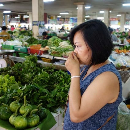 Chef Seng Luangrath in a market in Chiang Mai, Thailand. Picture: The Washington Post