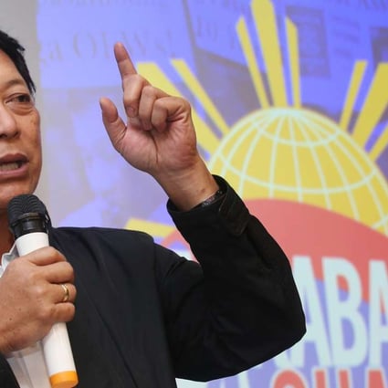 Philippine labour minister Silvestre Bello speaking at the University of Hong Kong on Sunday. Photo: David Wong