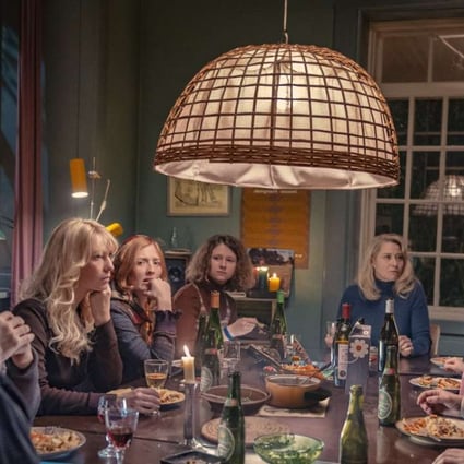 Trine Dyrholm (middle, dressed in blue) plays a co-founder of a commune in the film The Commune.