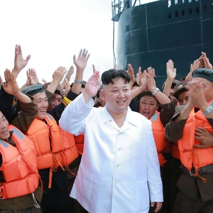 North Korean “supreme leader” Kim Jong-un inspects the test-firing of a strategic submarine-launched ballistic missile at an undisclosed location. Photo: AFP/ KCNA via KNS