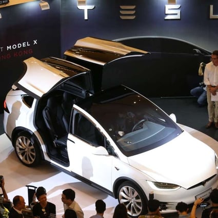 The Model X has falcon-wing doors that open up on either side of the vehicle to give passengers easy access to the second- and third-row seats. Photo: K. Y. Cheng