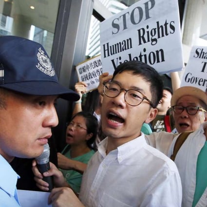 Nathan Law Kwun-chung (centre) and other Demosisto members protesting outside the Thai consulate in Hong Kong. Photo: Sam Tsang