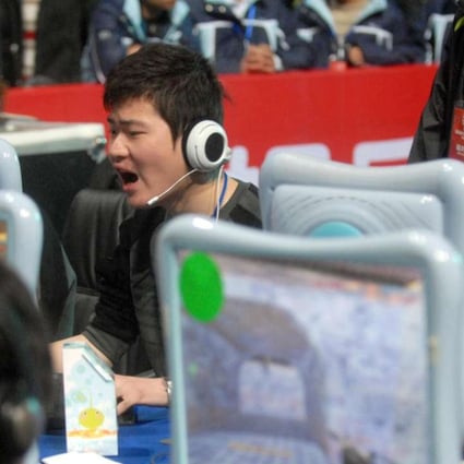 Players compete during e-sports festival held in Wuhan, Hubei province. Photo: Xinhua
