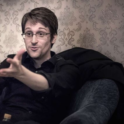 Edward Snowden is pictured during an interview in Moscow. He has donated money to the asylum seekers who housed him in Hong Kong. Photo: AFP