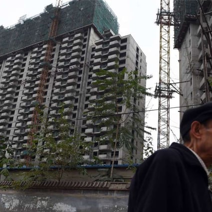 Apartments under construction in Beijing, where property market policies were tightened on September 30 in a bid to dampen rising prices. Photo: AFP