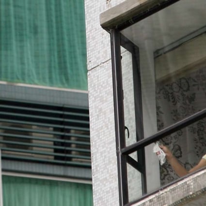 Fewer helpers will be cleaning the outsides of windows from now on. Photo: David Wong