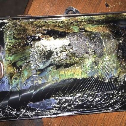 A burnt Samsung Galaxy Note 7 on a table in the United States. Photo: AP