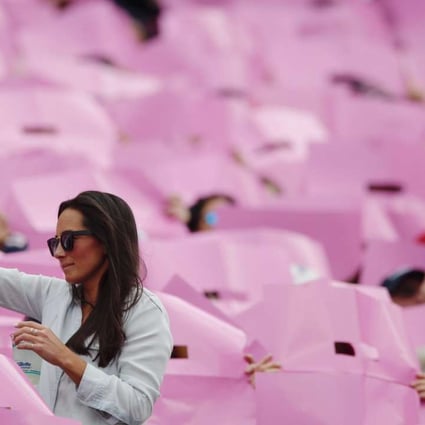 People in Gillette Stadium, in Foxboro, Massachusetts, mark breast cancer awareness month during a football game. With the advent of social media, there is a perception at times that the disease has been tamed. Photo: EPA