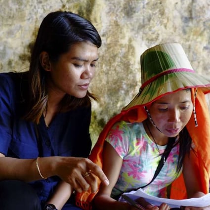 Two performers preparing for the Kampot Writers and Readers Festival last year.