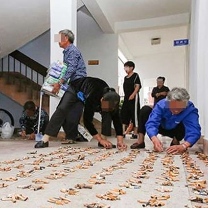 The Shengzhou city government has cut short a campaign exchanging tissues for discarded cigarette butts after too many residents took part. Photo: SCMP Pictures