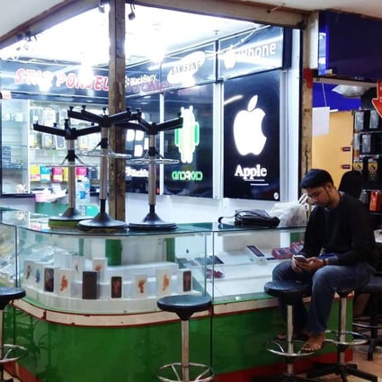 A phone shop at a shopping centre in Jakarta. Photo: AFP