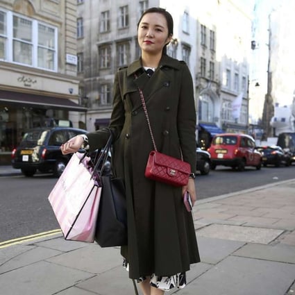 Chinese tourist Ines Chou on New Bond Street in London. Many Chinese visitors are drawn by the craftsmanship and authenticity of UK brands. Photo: Reuters