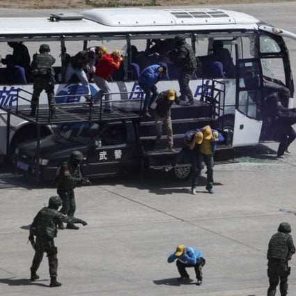 A file picture of Chinese commandos taking part in an anti-terrorism training exercise in Beijing in 2014 simulating a bus hijacking. Photo: Reuters