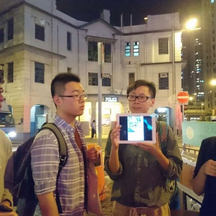 On the 20,000 Ways to Die in Yau Ma Tei tour are Ben Lam (left), Chris Ko and Holok Chan of the Student Christian Movement of Hong Kong, and Melody Chan, the guide.