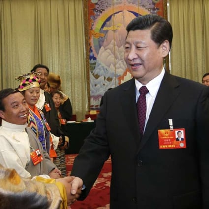 Chen Quanguo (right) accompanies Communist Party general secretary Xi Jinping as he greets a National People’s Congress deputy from Tibet in Beijing in 2013. Photo: Xinhua