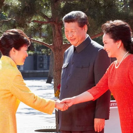 President Xi Jinping and first lady Peng Liyuan welcome South Korean President Park Geun-hye at Tiananmen Square in September last year. Park was in Beijing to attend a military parade to mark the 70th anniversary of the end of the second world war. Photo: EPA