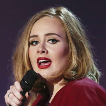 Adele onstage at the Brit Awards 2016 at the 02 Arena in London. Adele opened up to Vanity Fair about parenting and her struggle with postpartum depression in an issue for the magazine's December 2016 issue. Photo: AP