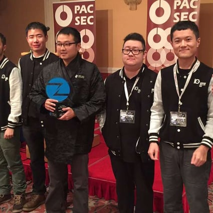 Members of the Keen Security Lab celebrate their victory at the phone hacking competition. Photo: SCMP Pictures