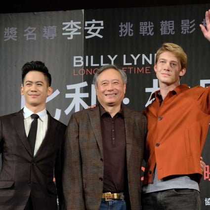 Actor Mason Lee, Oscar director Ang Lee and actor Joe Alwyn pose for photos during a press conference to promote Billy Lynn’s Long Halftime Walk in Taipei on Thursday. Photo: AFP