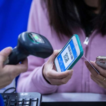 Mobile payments in China surged 52 per cent to 9.4 trillion yuan in the second quarter of this year from the same period of 2015, according to iResearch. Photo: Imaginechina