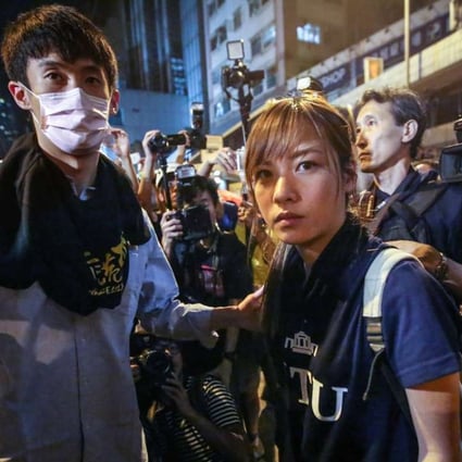 Sixtus “Baggio” Leung Chung-hang and Yau Wai-ching with protesters on Des Voeux street near the Chinese Liaison Office in Hong Kong during a protest against an expected interpretation of the city's constitution. Photo: Edward Wong