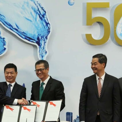 Marking 50 years of water supply from the Dongjiang to Hong Kong and the signing of the 2015-2017 agreement are (from left) Chen Lei, water resources minister, Lin Xudian, director-general of Guangdong’s Department of Water Resources, Hong Kong development chief Paul Chan, Chief Executive Leung Chun-ying, Financial Secretary John Tsang and Raymond Tam, secretary for Constitutional and Mainland Affairs, on May 28 last year. Photo: Felix Wong