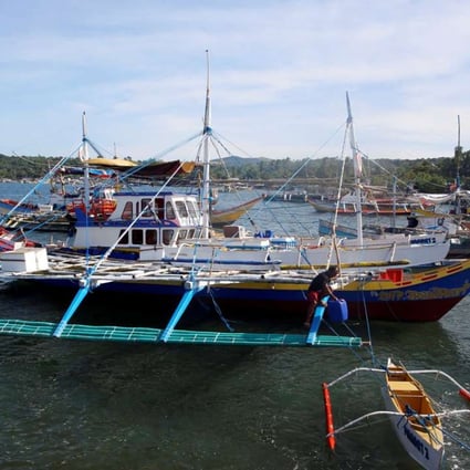 Fishermen prepare to travel to the disputed Scarborough Shoal to fish, at the coastal village of Cato in Infanta, Pangasinan in the Philippines on November 3. Photo: Reuters