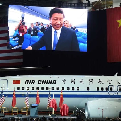 Chinese President Xi Jinping is seen on a screen touring a 737-800 aircraft at the Boeing assembly line in Everett, Washington, during a state visit to the US in September last year. The US understands China’s desire to reform global institutions that reflects its increasing footprint in the global economy and global security architecture. Photo: AFP
