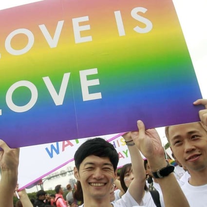A file picture of revellers at a gay pride parade in Taipei last year. Taiwanese lawmakers are working on three bills in support of marriage equality. Photo: AP