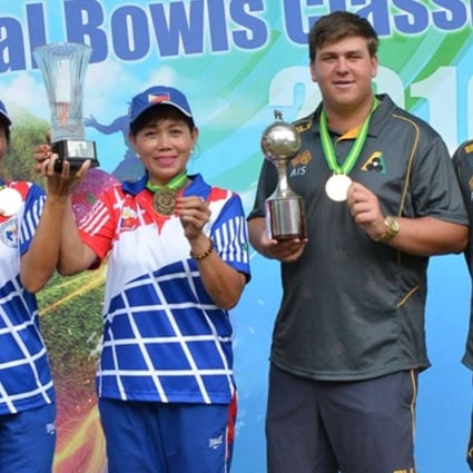 Philippines' Rosita Bradborn and Sonia Bruce celebrate with Australia’s Corey Wedlock and Nathan Pedersen after winning the women and men's pairs titles at the Hong Kong International Bowls Classic on Sunday. Photos: SCMP Pictures