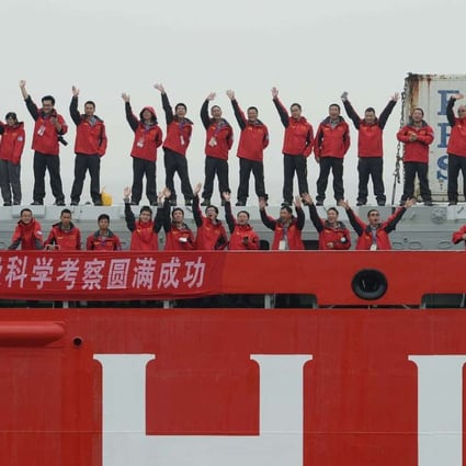 Chinese expendition team members aboard the polar research vessel Xue Long wave goodbye as they set sail from Shanghai. Photo: AFP