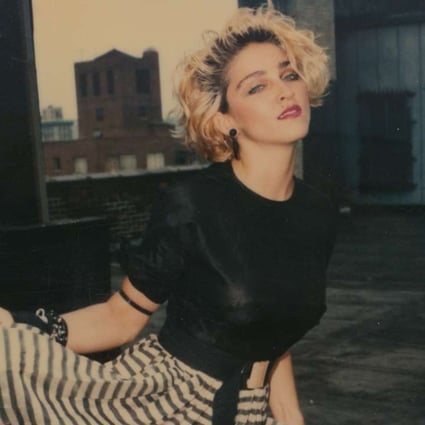 Madonna on the roof of her brother’s flat in this Polaroid image, one of 66 shot by photographer Richard Corman on June 17, 1983, and published in a new book, Madonna 66.