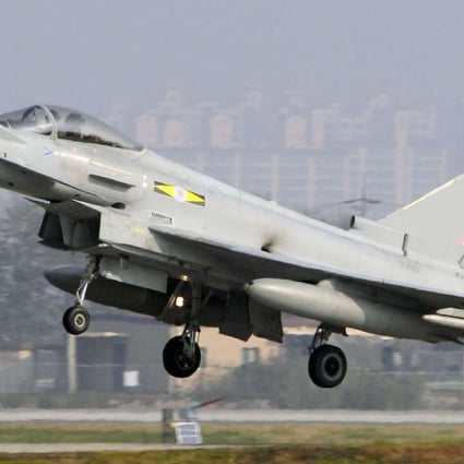 A British Royal Air Force Typhoon fighter jet takes off from the US Air Force Osan Air Base, 70km south of Seoul. Photo: Kyodo