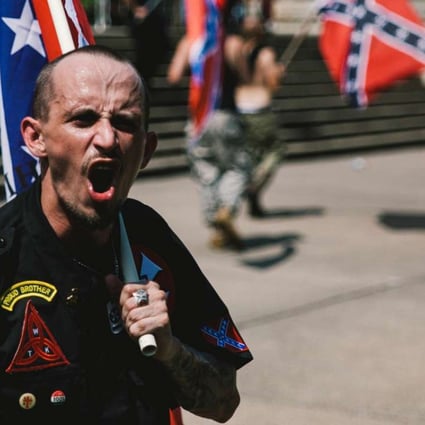 A member of th Ku Klux Klan attends a rally in South Carolina. Photo: TNS