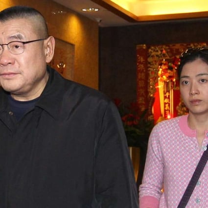 Joseph Lau (Left) leaves a restaurant with Chan Hoi-wan. Photo: Dickson Lee