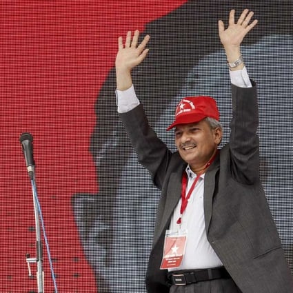 Nepal’s former prime minster Baburam Bhattarai announces his new Naya Shaktai Nepal Party in front of supporters in Kathmandu in June. Photo: AFP