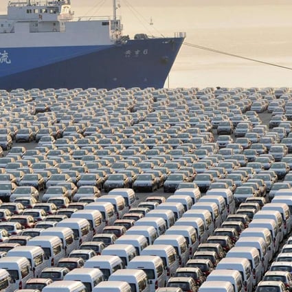 Chinese cars wait for export at a port in Dalian, Liaoning province in October. Reuters