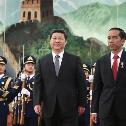 Chinese investment has surged in Indonesia following five meetings between China’s President Xi Jinping (left) and President Joko Widodo in the past two years. Photo: AFP