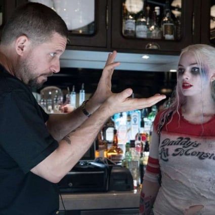 Suicide Squad director David Ayer guides Harley Quinn actress Margot Robbie. The two will reunite in Gotham City Sirens. Photo: Warner Bros. Pictures
