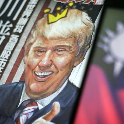 A newspaper illustration of US President-elect Donald Trump next to the flag of Taiwan in Taipei, Taiwan. Photo: EPA