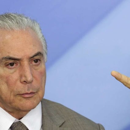 Brazil's President Michel Temer attends a press conference on new measures to stimulate the economy, at Planalto presidential palace, in Brasilia. Photo: AP