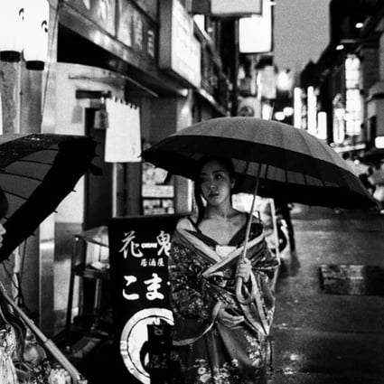Sheltering in the back streets: an image from the book Tokyo by Paul Bradshaw.