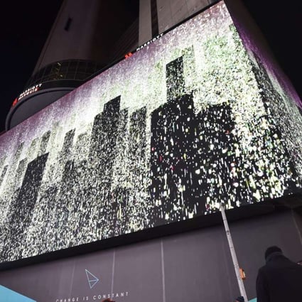 New York's Times Square illuminated by the world's highest-resolution video display screen of its size, nearly as big as a football field. Photo: AFP