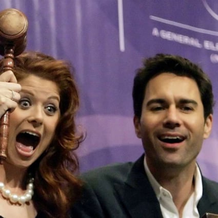 Members of the cast of the NBC television series "Will and Grace" Debra Messing (L) Eric McCormack (C) and Megan Mullally (R) clown around on the bell balcony overlooking the main trading floor of the New York Stock Exchange shortly before ringing the closing bell for the session in New York on May 18, 2006. Photo: Reuters