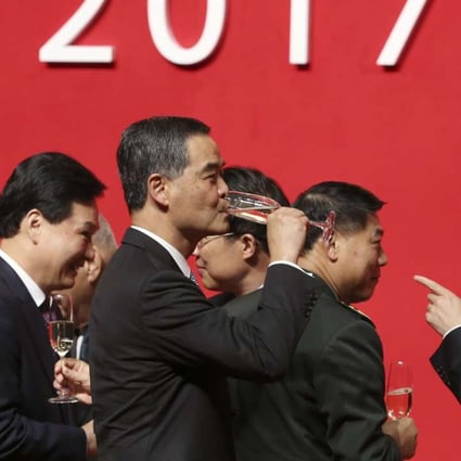 Chief Executive Leung Chun-ying (centre) and Director of the Central Government's Liaison Office in Hong Kong Zhang Xiaoming (right) attend the annual spring reception. Photo: Sam Tsang