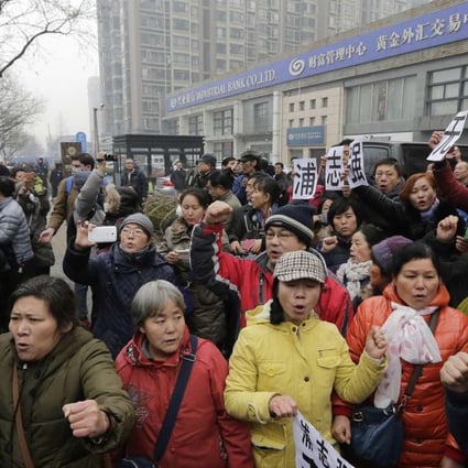 A file photo of supporters of rights lawyer Pu Zhiqiang gather near a Beijing court where his trial was heard in December 2015 following the authorities’ massive crackdown against rights lawyers and dissidents. Photo: AP