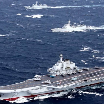 China's Liaoning aircraft carrier with accompanying fleet conducts a drill in an area of South China Sea. File photo: Reuters