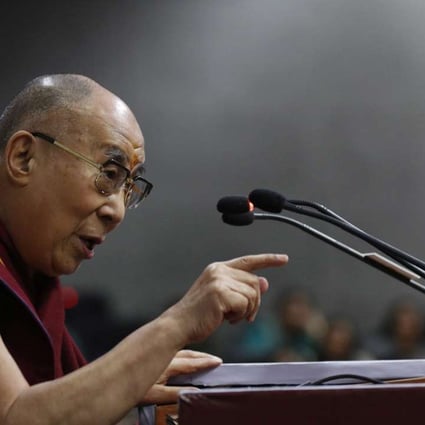 The Dalai Lama attends an event in New Delhi on Saturday. Photo: EPA